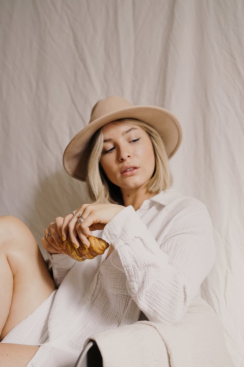 Woman in White Long Sleeve Shirt and Brown Fedora Hat